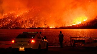 Northern California wildfire spreads and thousands are forced to evacuate