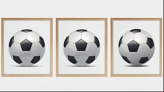 Choose one of the soccer balls in this image to discover what makes you unique